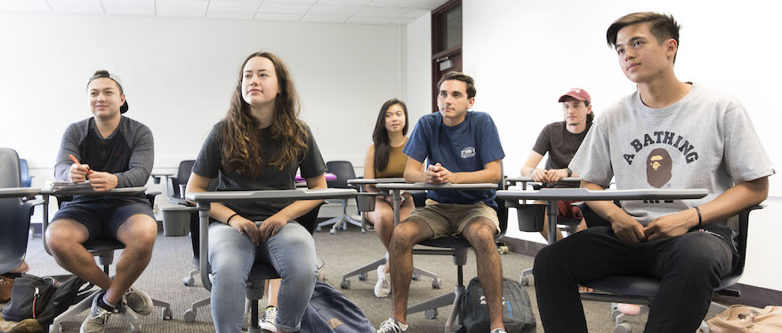 Students in classroom learning French